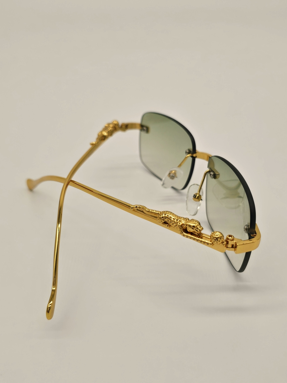 Gold-Frame Rimless Sunglasses with Green Gradient Lenses